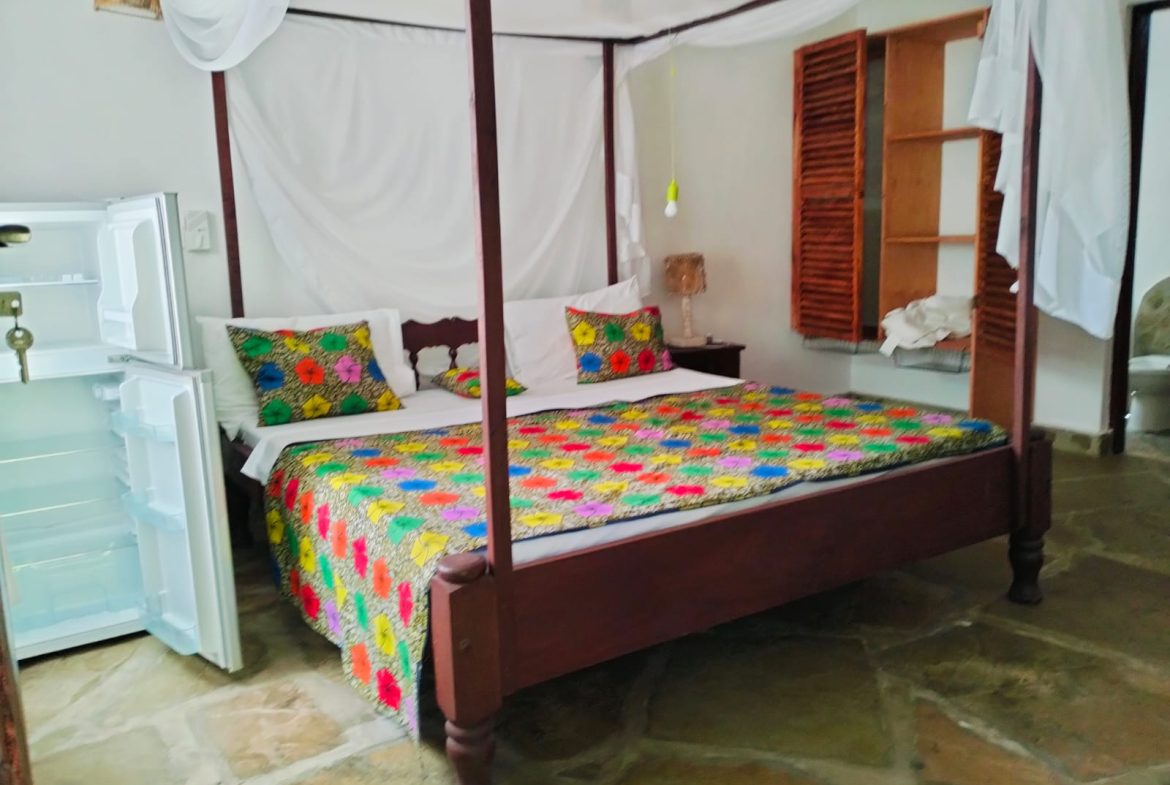 For sale: Three solar-powered bungalows in Watamu, just 15 minutes from the beach. Each en-suite one-bedroom chalet features stylish furnishings, a kitchenette, and shares a lush garden with a gazebo. Secure parking for three cars and priced at 13.5M ONO, offering excellent investment potential.