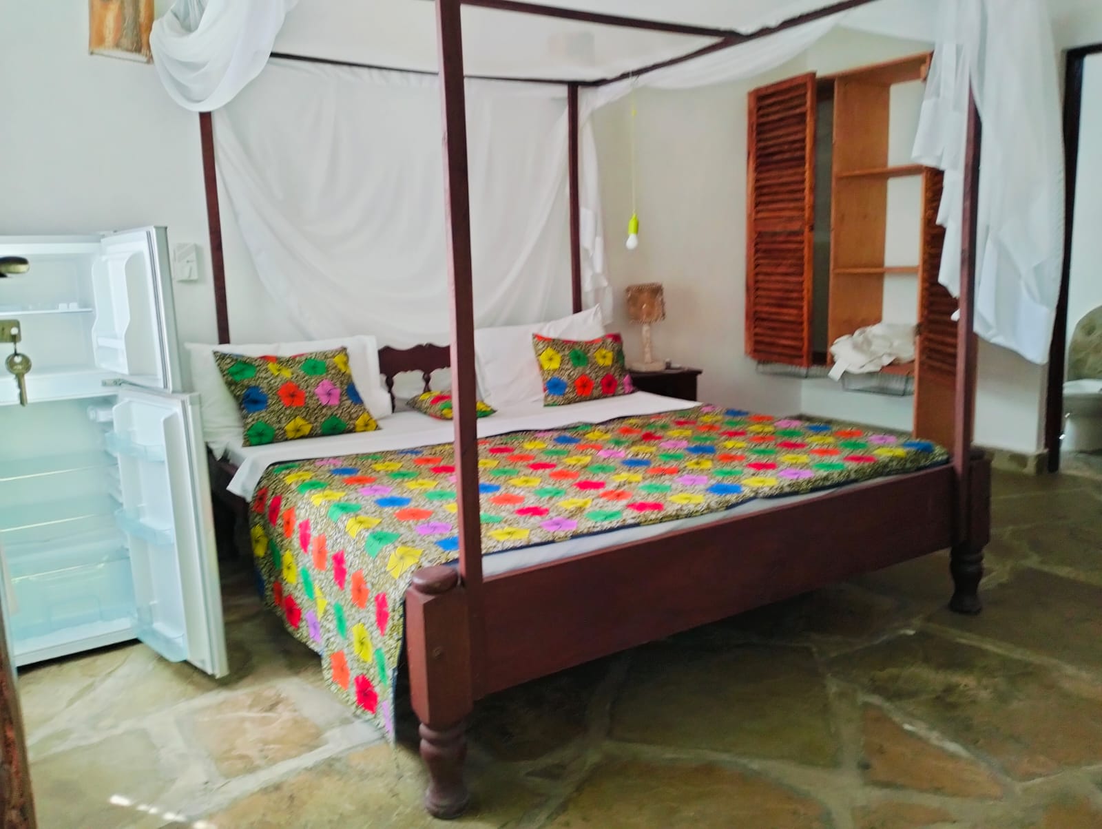 For sale: Three solar-powered bungalows in Watamu, just 15 minutes from the beach. Each en-suite one-bedroom chalet features stylish furnishings, a kitchenette, and shares a lush garden with a gazebo. Secure parking for three cars and priced at 13.5M ONO, offering excellent investment potential.