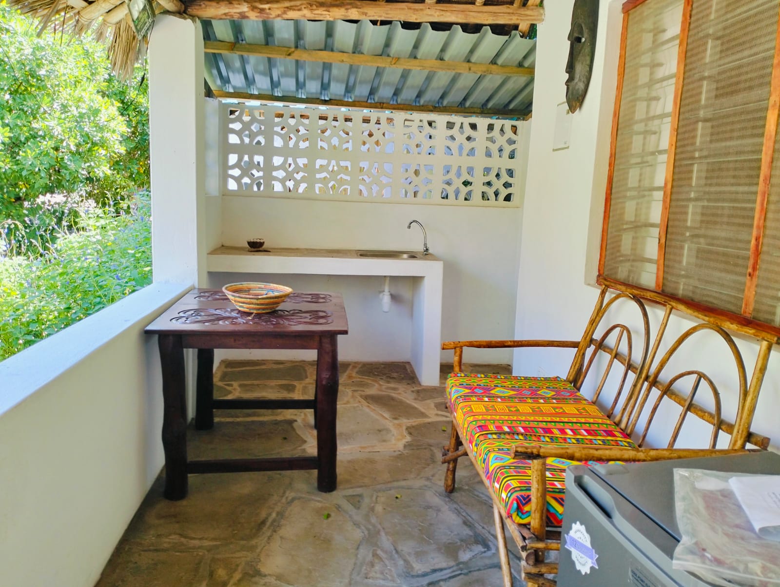 For sale: Three solar-powered bungalows in Watamu, just 15 minutes from the beach. Each en-suite one-bedroom chalet features stylish furnishings, a kitchenette, and shares a lush garden with a gazebo. Secure parking for three cars and priced at 13.5M ONO, offering excellent investment potential.