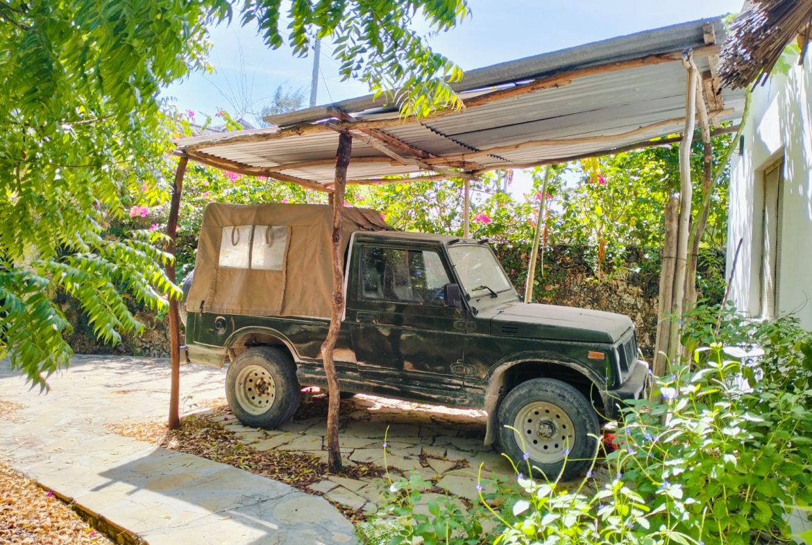 For sale: Three solar-powered bungalows in Watamu, just 15 minutes from the beach. Each en-suite one-bedroom chalet features stylish furnishings, a kitchenette, and shares a lush garden with a gazebo. Secure parking for three cars and priced at 13.5M ONO, offering excellent investment potential.