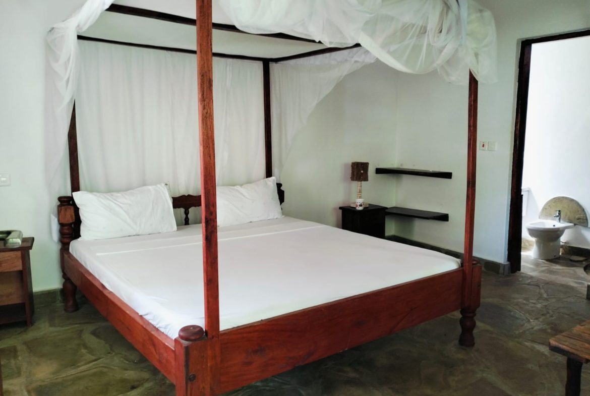 For sale: Three solar-powered bungalows in Watamu, just 15 minutes from the beach. Each en-suite one-bedroom chalet features stylish furnishings, a kitchenette, and shares a lush garden with a gazebo. Secure parking for three cars and priced at 13.5M ONO, offering excellent investment potential.