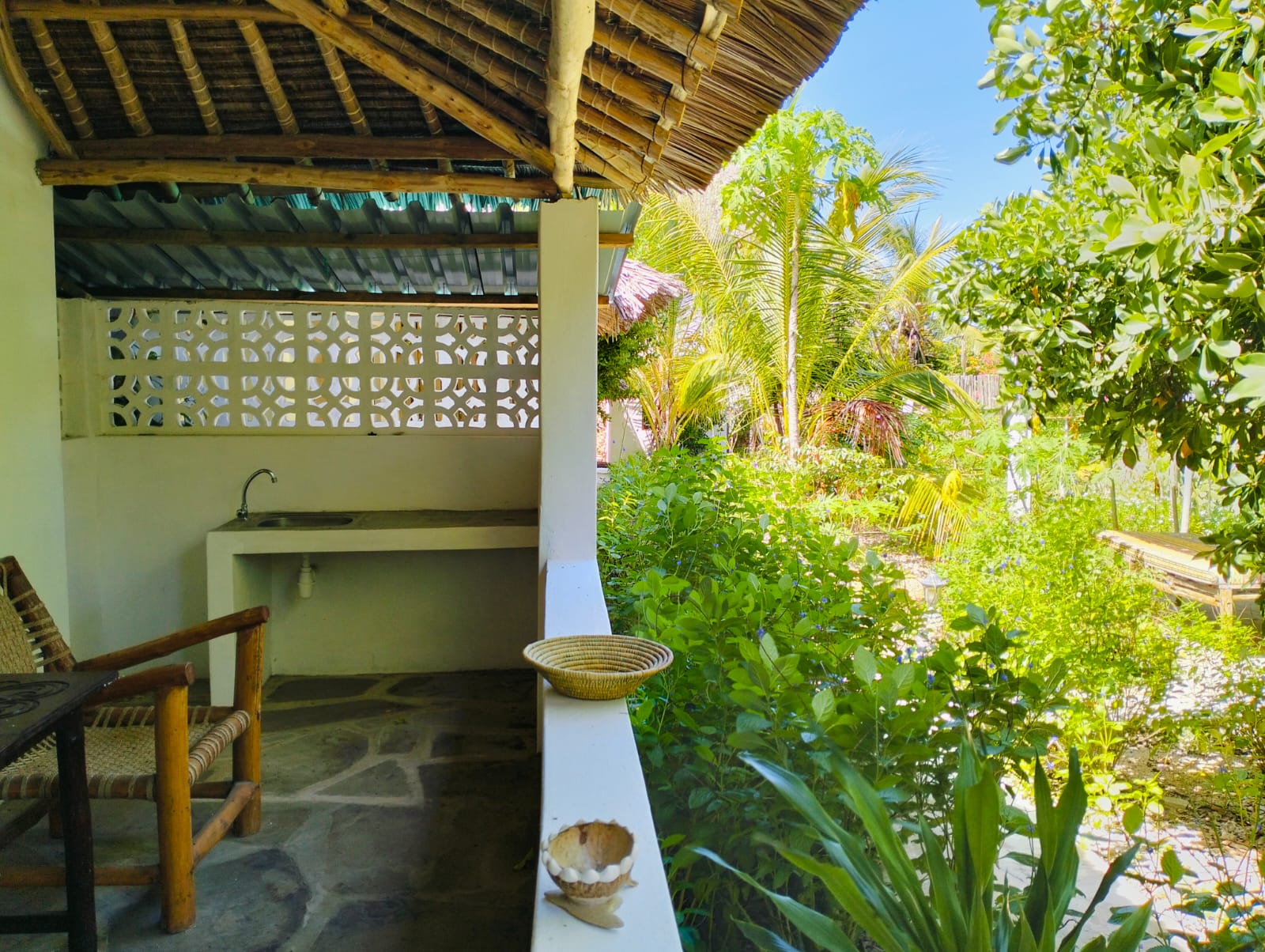 For sale: Three solar-powered bungalows in Watamu, just 15 minutes from the beach. Each en-suite one-bedroom chalet features stylish furnishings, a kitchenette, and shares a lush garden with a gazebo. Secure parking for three cars and priced at 13.5M ONO, offering excellent investment potential.