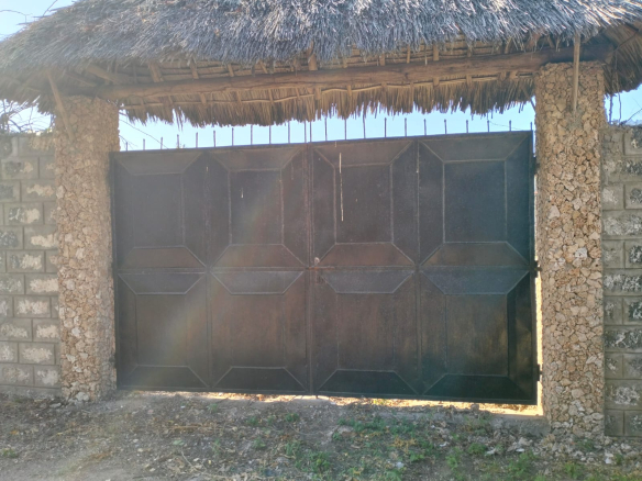 walled 0.5 acre plot for sale in Watamu