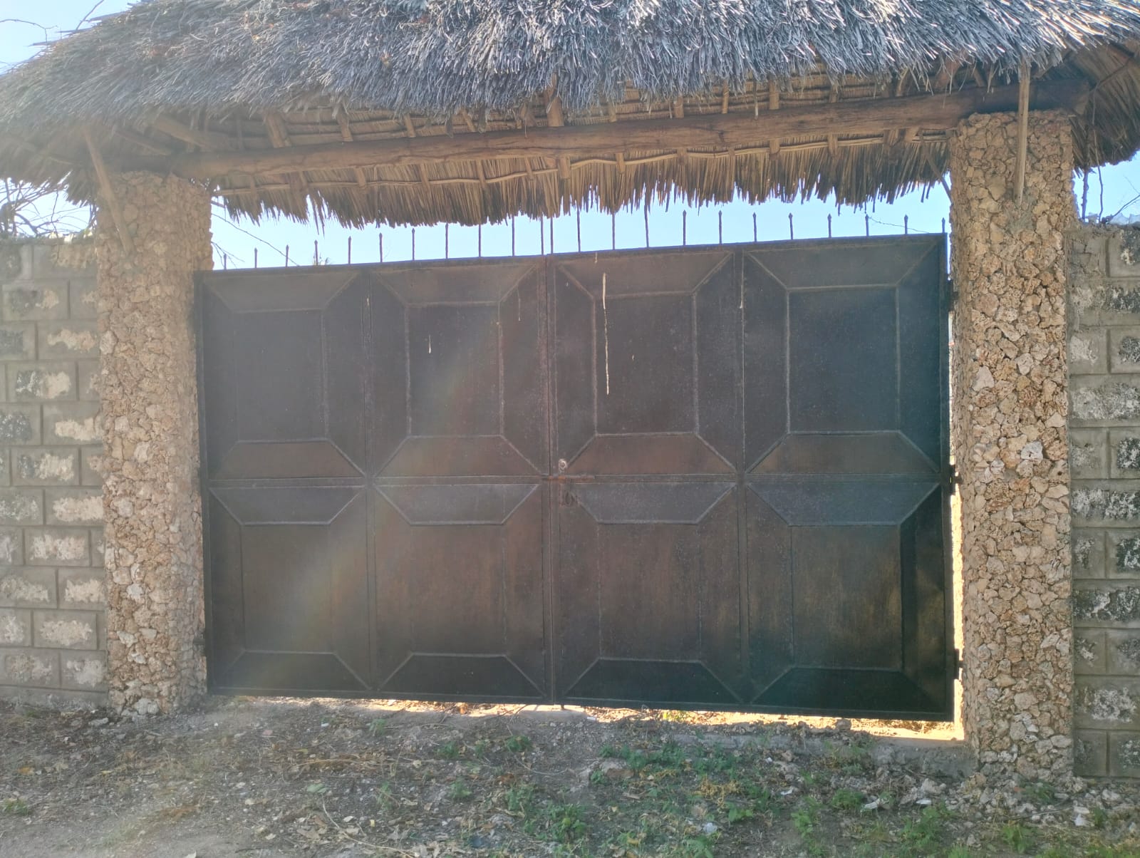 walled 0.5 acre plot for sale in Watamu