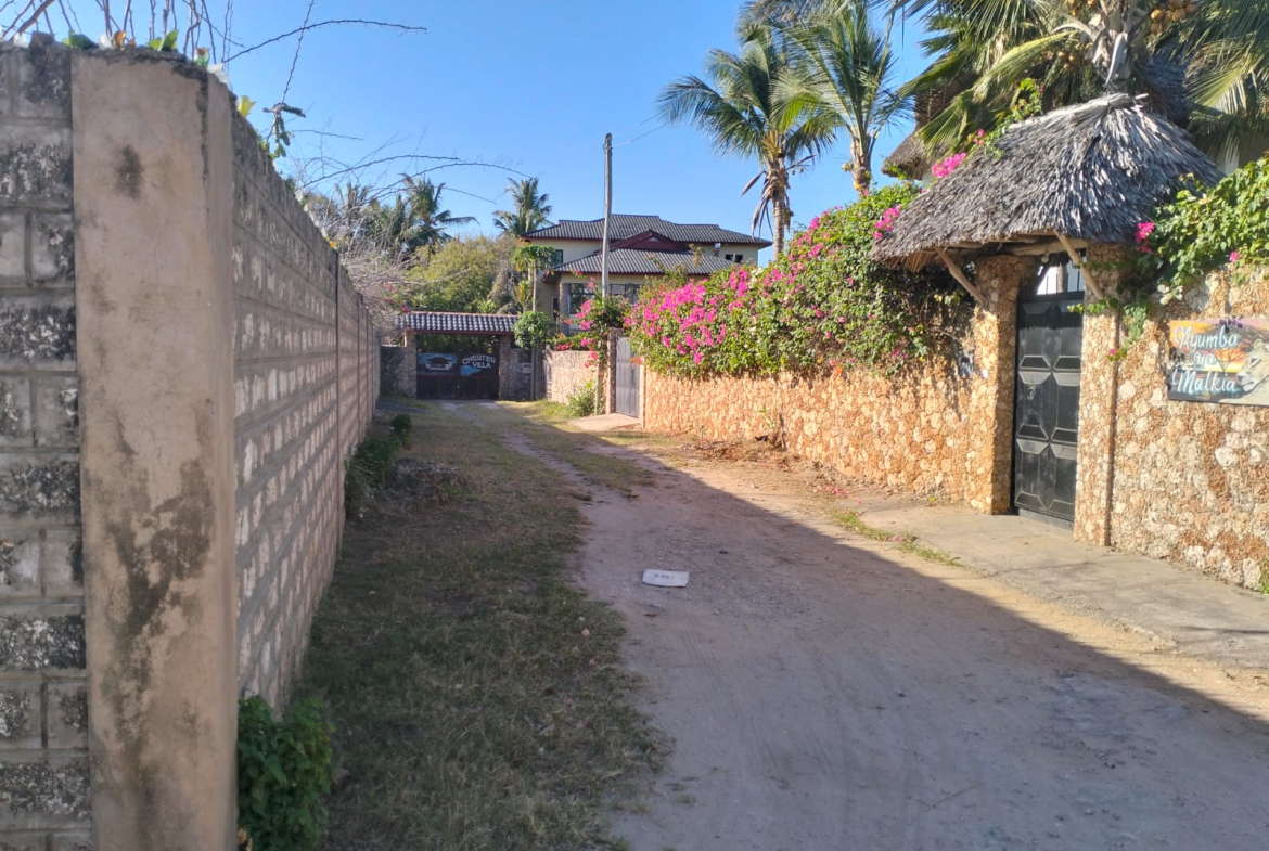 walled 0.5 acre plot for sale in Watamu