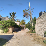 walled 0.5 acre plot for sale in Watamu