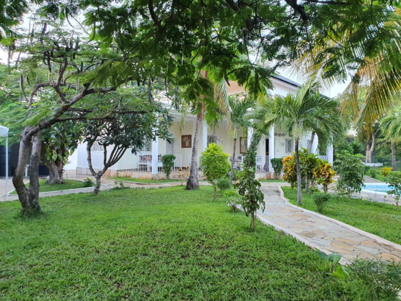 Elegant 4-Bedroom Villa for Sale on Casuarina Road house from the garden