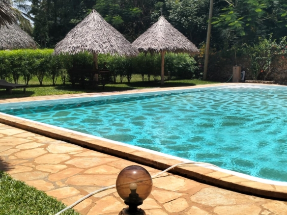 3 bedroom villa for sale, Tamarind Cove villa, Casuarina Road villa, private pool, renewed Makuti roof, fully furnished villa, gated community