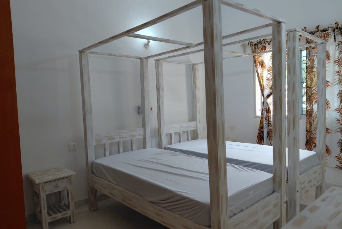 “Watamu short-stay 2-bedroom furnished apartment near Turtle Bay – master en-suite, WIFI, sleeps 4”