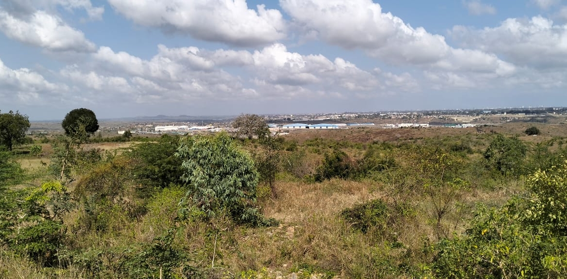 4.86 acres in Mazeras (Bonje), 1.2km off Mombasa Road. Solid rock, all-weather access, 3-phase power, panoramic Port Reitz views. Asking KSh 30.2M. Contact Mkaazi.