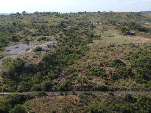 4.86 acres in Mazeras (Bonje), 1.2km off Mombasa Road. Solid rock, all-weather access, 3-phase power, panoramic Port Reitz views. Asking KSh 30.2M. Contact Mkaazi.