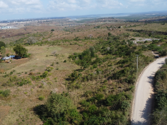 4.86 acres in Mazeras (Bonje), 1.2km off Mombasa Road. Solid rock, all-weather access, 3-phase power, panoramic Port Reitz views. Asking KSh 30.2M. Contact Mkaazi.