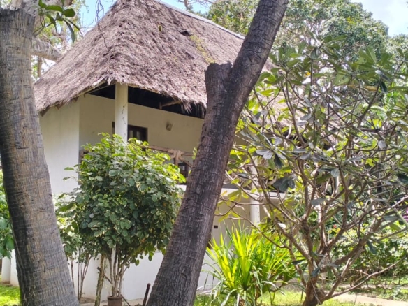 Boutique resort for sale Kenya, coastal property investment, resort with pool Kenya, freehold title property, apartments for sale [Insert Location], hospitality investment Kenya, resort for renovation Kenya