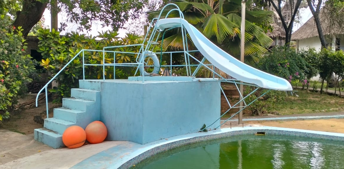 Boutique resort for sale Kenya, coastal property investment, resort with pool Kenya, freehold title property, apartments for sale [Insert Location], hospitality investment Kenya, resort for renovation Kenya