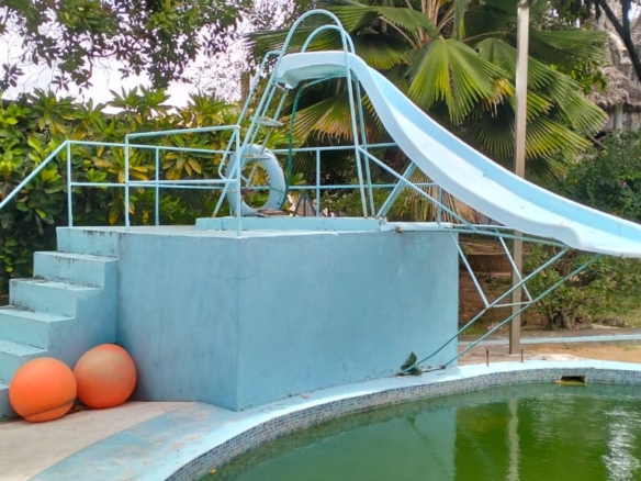 Boutique resort for sale Kenya, coastal property investment, resort with pool Kenya, freehold title property, apartments for sale [Insert Location], hospitality investment Kenya, resort for renovation Kenya