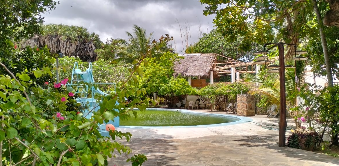 Boutique resort for sale Kenya, coastal property investment, resort with pool Kenya, freehold title property, apartments for sale [Insert Location], hospitality investment Kenya, resort for renovation Kenya