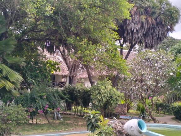 Boutique resort for sale Kenya, coastal property investment, resort with pool Kenya, freehold title property, apartments for sale [Insert Location], hospitality investment Kenya, resort for renovation Kenya