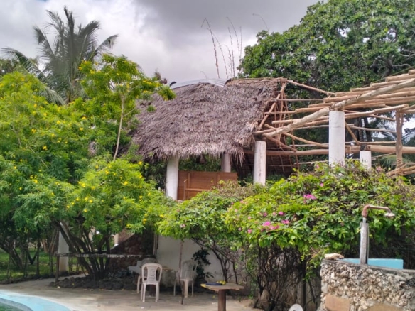 Boutique resort for sale Kenya, coastal property investment, resort with pool Kenya, freehold title property, apartments for sale [Insert Location], hospitality investment Kenya, resort for renovation Kenya