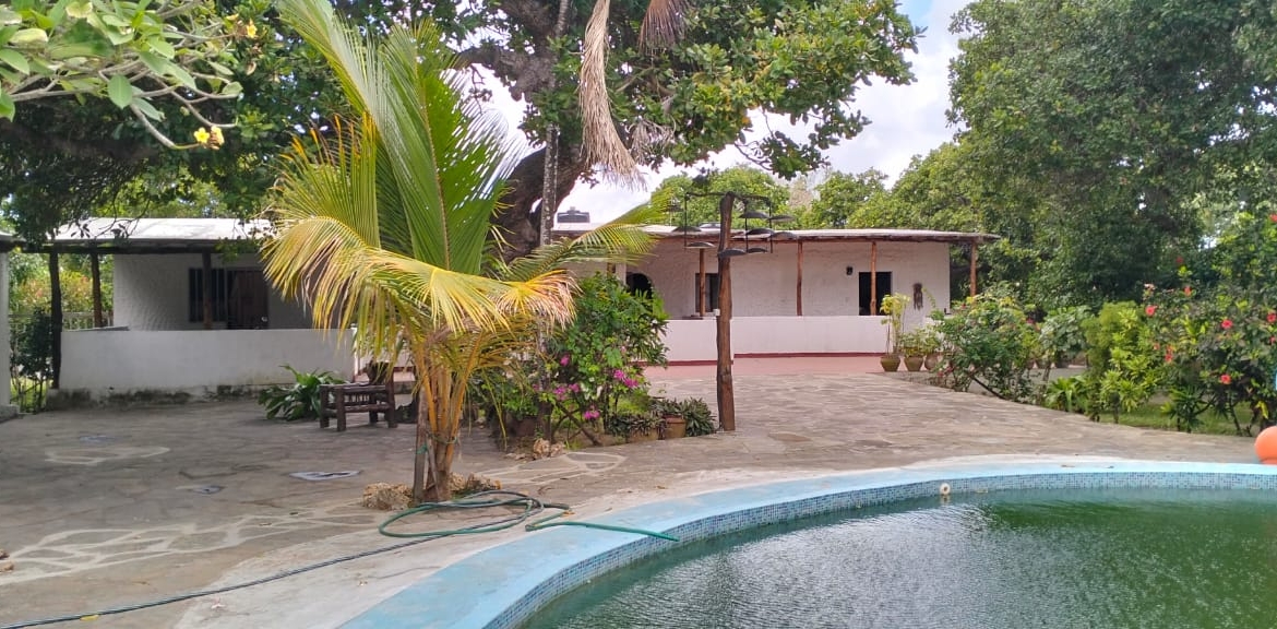 Boutique resort for sale Kenya, coastal property investment, resort with pool Kenya, freehold title property, apartments for sale [Insert Location], hospitality investment Kenya, resort for renovation Kenya