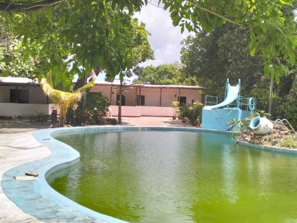 Boutique resort for sale Kenya, coastal property investment, resort with pool Kenya, freehold title property, apartments for sale [Insert Location], hospitality investment Kenya, resort for renovation Kenya