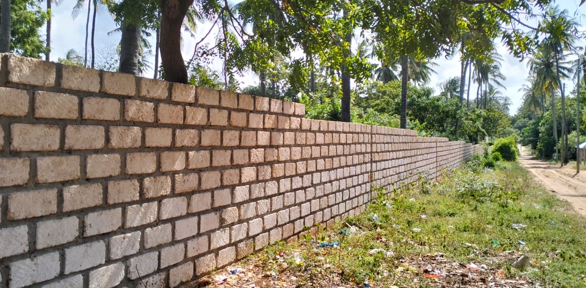1 acre walled plot for sale in Watamu (Dongo Kundu). Secure coastal land ideal for villa, lodge or investment. KES 25M. Video tour & viewings — contact Mkaazi.