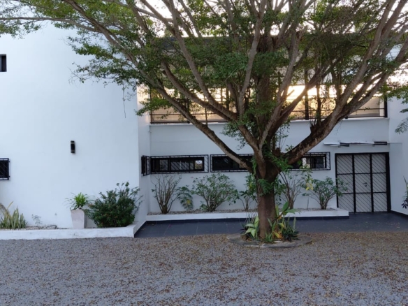 Luxury U-Shaped 4-Bedroom Home in Watamu | ½ Acre, Infinity Pool, 5-Car Garage & Private Garden – KES 42M