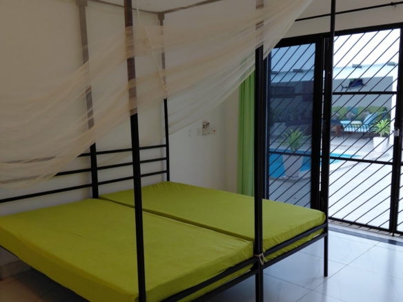 Luxury U-Shaped 4-Bedroom Home in Watamu | ½ Acre, Infinity Pool, 5-Car Garage & Private Garden – KES 42M