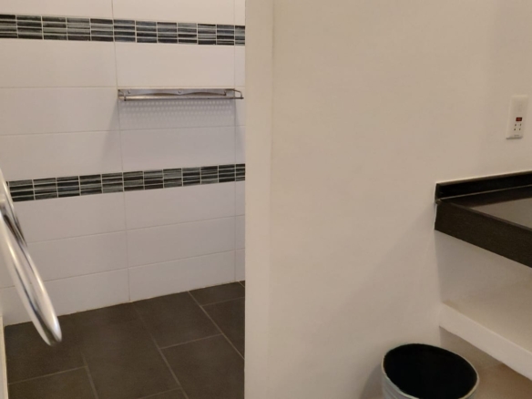 Luxury U-Shaped 4-Bedroom Home in Watamu | ½ Acre, Infinity Pool, 5-Car Garage & Private Garden – KES 42M