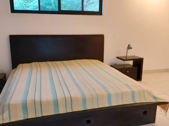 Luxury U-Shaped 4-Bedroom Home in Watamu | ½ Acre, Infinity Pool, 5-Car Garage & Private Garden – KES 42M