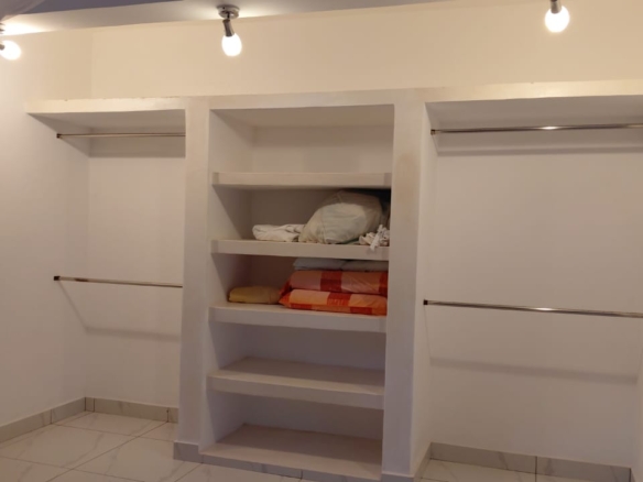 Luxury U-Shaped 4-Bedroom Home in Watamu | ½ Acre, Infinity Pool, 5-Car Garage & Private Garden – KES 42M