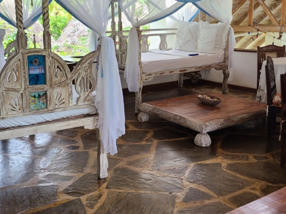 Exceptional short-stay villa for corporate retreats and private events. 5 ensuite bedrooms, pool, rooftop terrace and dedicated in-house chef. Contact Mkaazi Real Estate for packages and viewings.