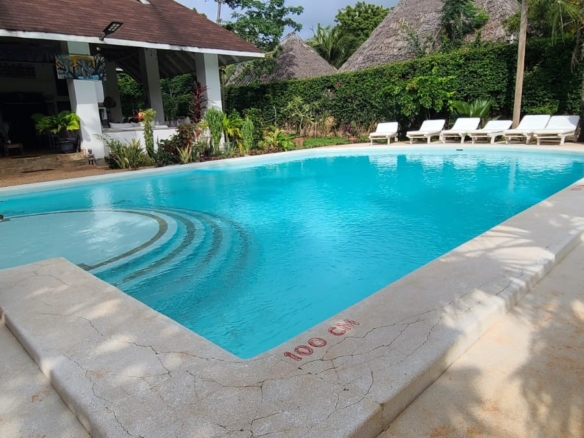 Exceptional short-stay villa for corporate retreats and private events. 5 ensuite bedrooms, pool, rooftop terrace and dedicated in-house chef. Contact Mkaazi Real Estate for packages and viewings.