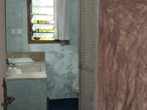 For Sale: Furnished 4BR Moroccan-style beachfront villa on Silversands Beach, Malindi. Ocean-view Jacuzzi, pool, DSQ, art-filled garden. USD 500K.