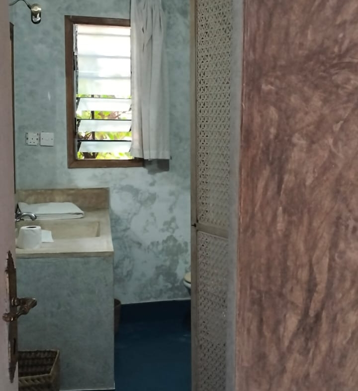 For Sale: Furnished 4BR Moroccan-style beachfront villa on Silversands Beach, Malindi. Ocean-view Jacuzzi, pool, DSQ, art-filled garden. USD 500K.