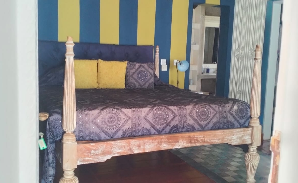 For Sale: Furnished 4BR Moroccan-style beachfront villa on Silversands Beach, Malindi. Ocean-view Jacuzzi, pool, DSQ, art-filled garden. USD 500K.