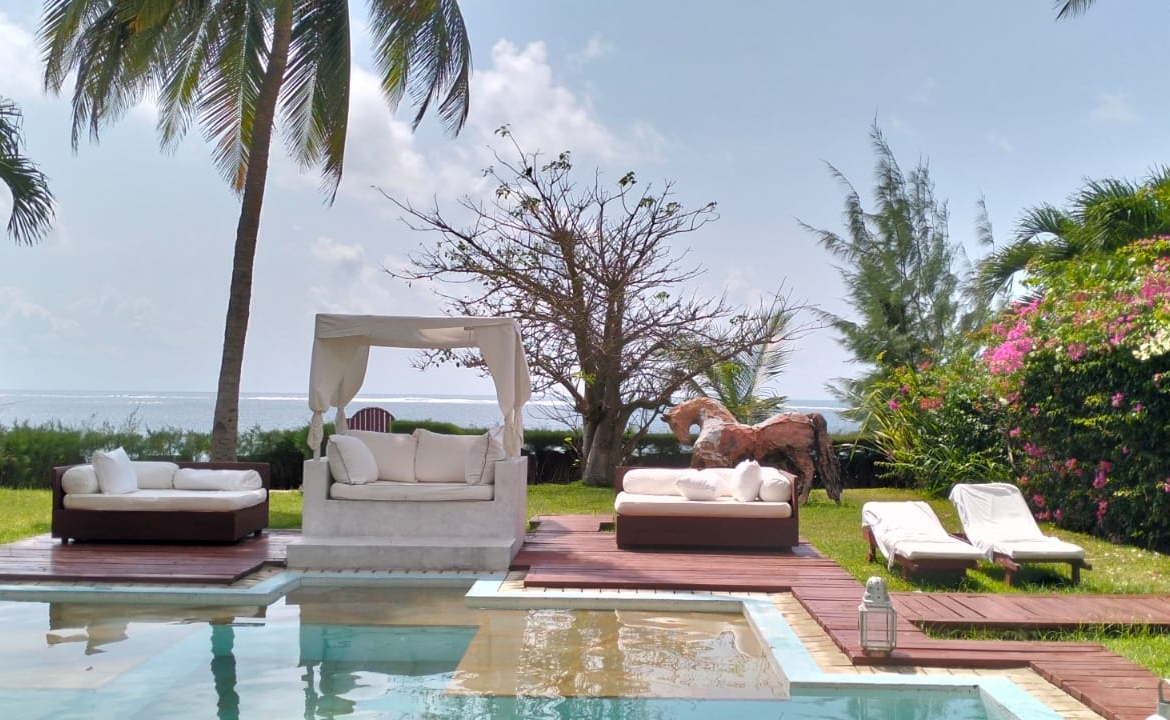 For Sale: Furnished 4BR Moroccan-style beachfront villa on Silversands Beach, Malindi. Ocean-view Jacuzzi, pool, DSQ, art-filled garden. USD 500K.