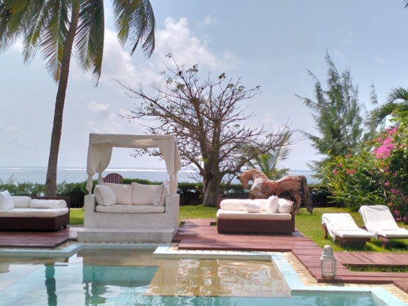 For Sale: Furnished 4BR Moroccan-style beachfront villa on Silversands Beach, Malindi. Ocean-view Jacuzzi, pool, DSQ, art-filled garden. USD 500K.