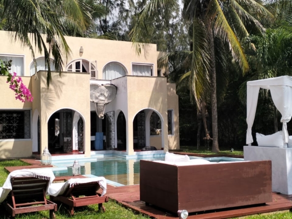 For Sale: Furnished 4BR Moroccan-style beachfront villa on Silversands Beach, Malindi. Ocean-view Jacuzzi, pool, DSQ, art-filled garden. USD 500K.