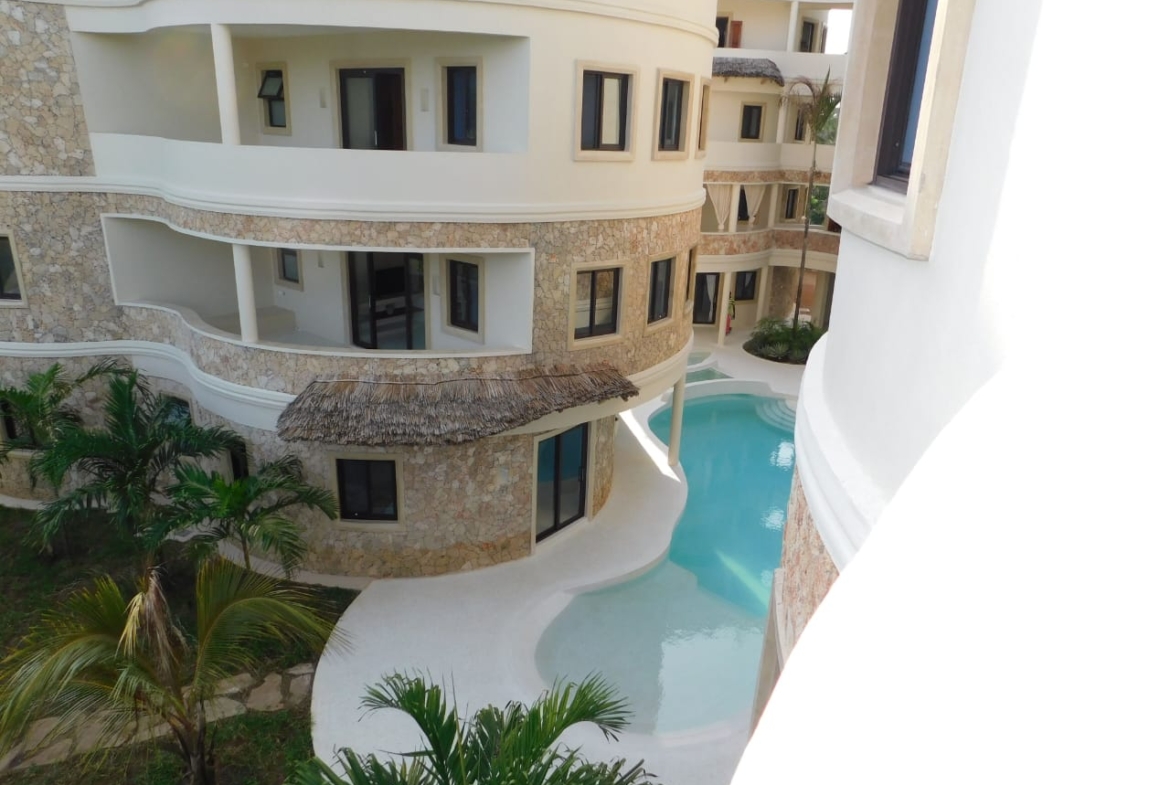 Stay in fully furnished 1 & 2-bedroom Marine Park Watamu apartments. Ocean-view balconies, pool, daily rates from KES 11,000/night.