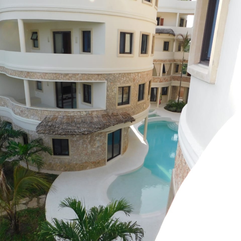 Stay in fully furnished 1 & 2-bedroom Marine Park Watamu apartments. Ocean-view balconies, pool, daily rates from KES 11,000/night.
