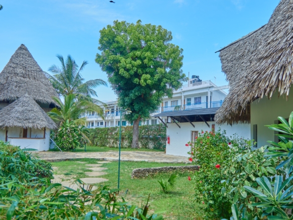 Fully furnished 2-bedroom duplex cottage for sale at Park Marine Villas, Silversands Road Malindi. Each floor has a bedroom. Steps to beach, 2 pools. €125,000.