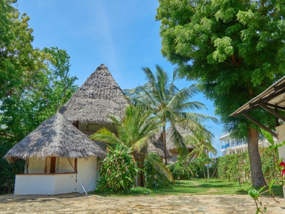 Fully furnished 2-bedroom duplex cottage for sale at Park Marine Villas, Silversands Road Malindi. Each floor has a bedroom. Steps to beach, 2 pools. €125,000.