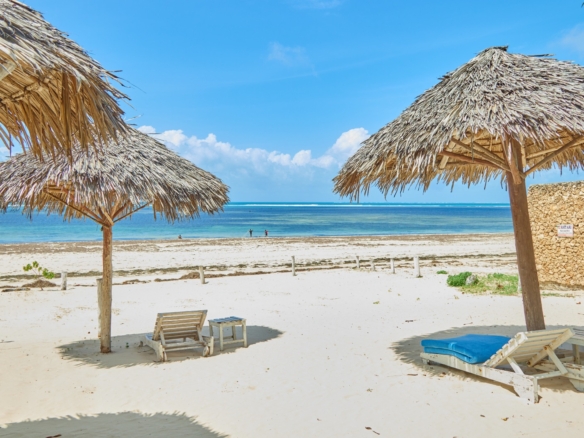 Fully furnished 2-bedroom duplex cottage for sale at Park Marine Villas, Silversands Road Malindi. Each floor has a bedroom. Steps to beach, 2 pools. €125,000.