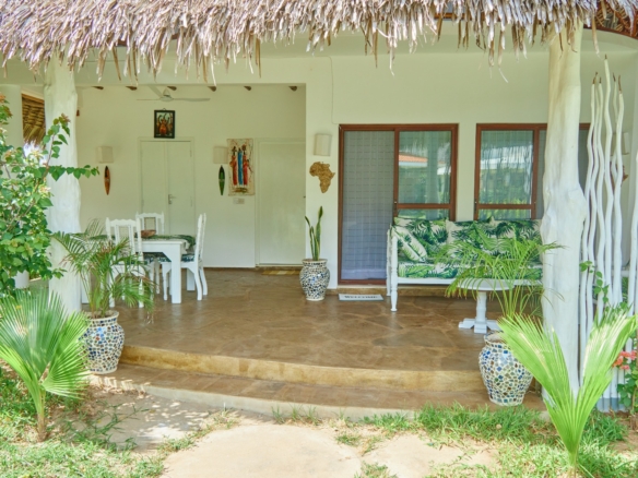 Fully furnished 2-bedroom duplex cottage for sale at Park Marine Villas, Silversands Road Malindi. Each floor has a bedroom. Steps to beach, 2 pools. €125,000.