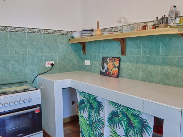 Fully furnished 2-bedroom duplex cottage for sale at Park Marine Villas, Silversands Road Malindi. Each floor has a bedroom. Steps to beach, 2 pools. €125,000.
