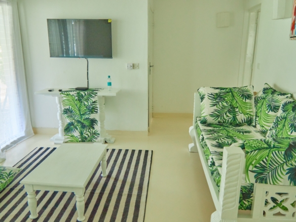 Fully furnished 2-bedroom duplex cottage for sale at Park Marine Villas, Silversands Road Malindi. Each floor has a bedroom. Steps to beach, 2 pools. €125,000.