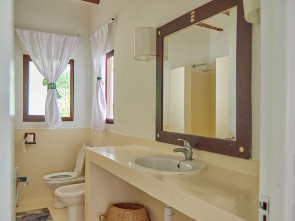 Fully furnished 2-bedroom duplex cottage for sale at Park Marine Villas, Silversands Road Malindi. Each floor has a bedroom. Steps to beach, 2 pools. €125,000.