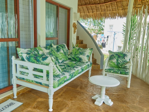 Fully furnished 2-bedroom duplex cottage for sale at Park Marine Villas, Silversands Road Malindi. Each floor has a bedroom. Steps to beach, 2 pools. €125,000.