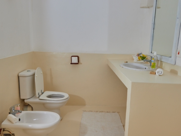 Fully furnished 2-bedroom duplex cottage for sale at Park Marine Villas, Silversands Road Malindi. Each floor has a bedroom. Steps to beach, 2 pools. €125,000.