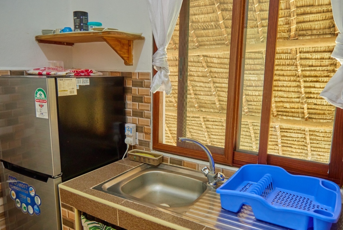 Fully furnished 2-bedroom duplex cottage for sale at Park Marine Villas, Silversands Road Malindi. Each floor has a bedroom. Steps to beach, 2 pools. €125,000.